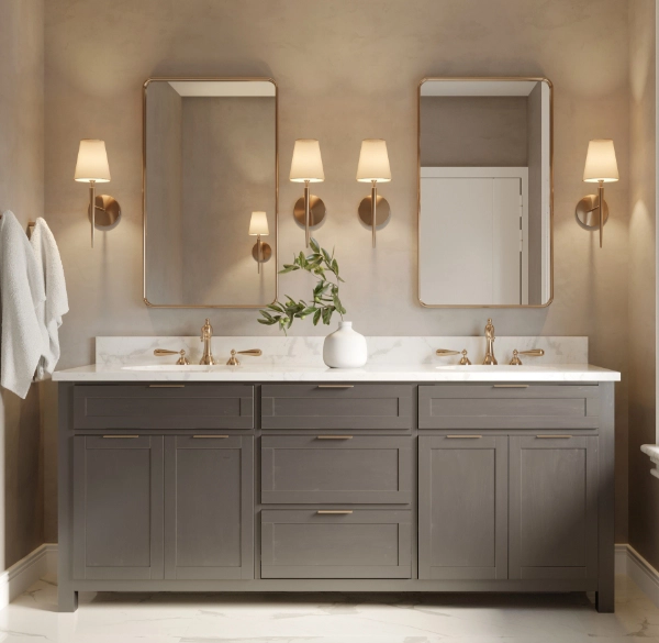 Modern bathroom with double vanity and gold fixtures.